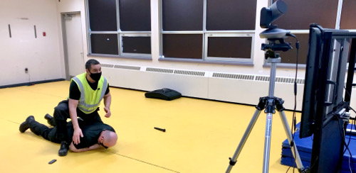 Instructors Rick Blouin (kneeling) and Wayne Rudderham demonstrating camera