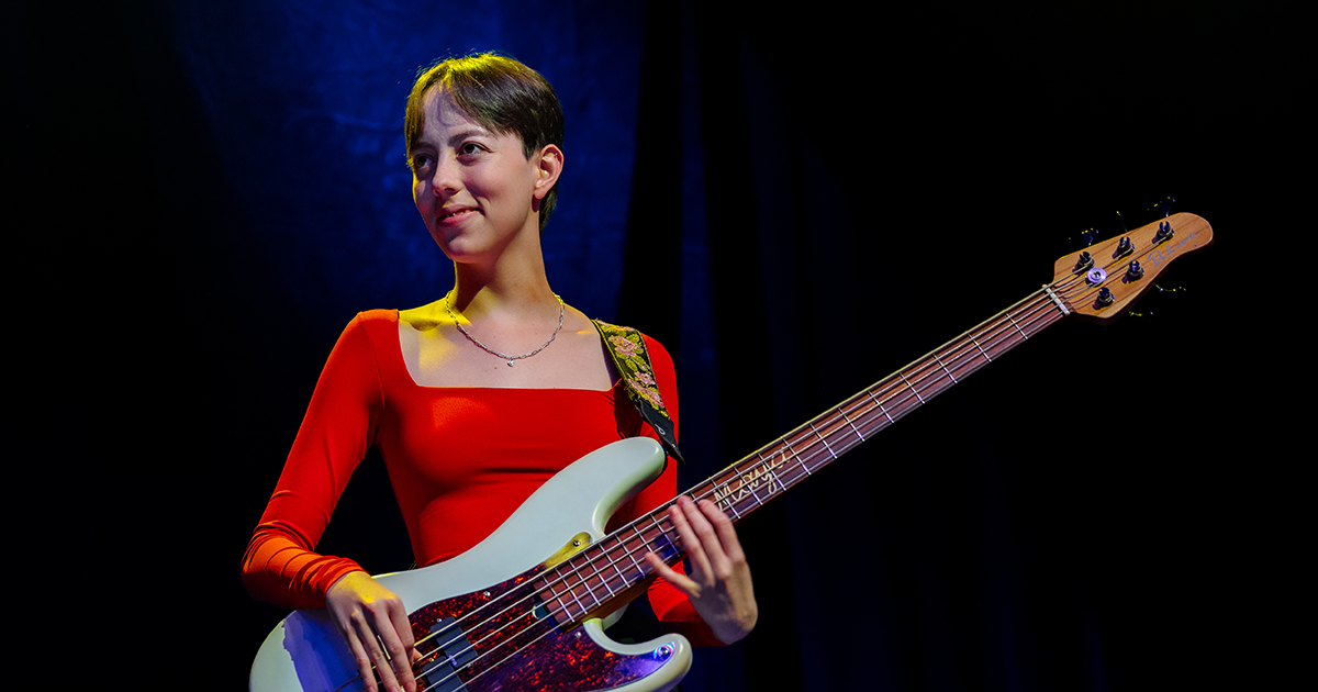 Maya Marquez, on stage with her Bass