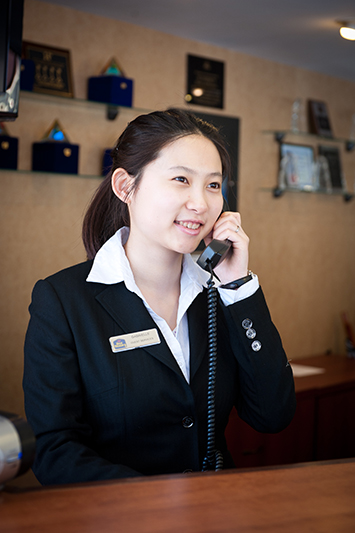 A student working at a hotel during their internship